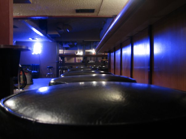 Bar stools glowing blue